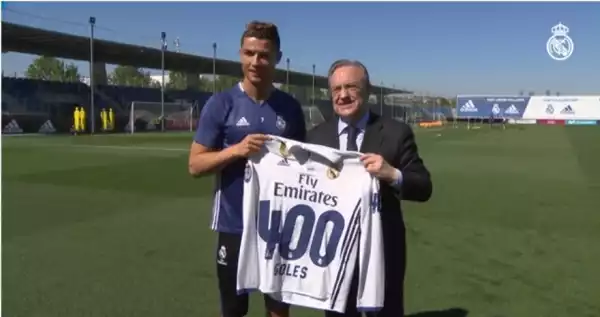 Real Madrid President Presents Cristiano Ronaldo With A Shirt For His 400 Goals With Club {See Photos}